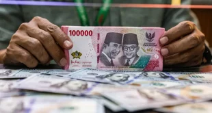 Rupiah Terancam Melemah ke Rp 18.060: Bagaimana Gubernur BI Perry Warjiyo Berdampak pada Pasar?
