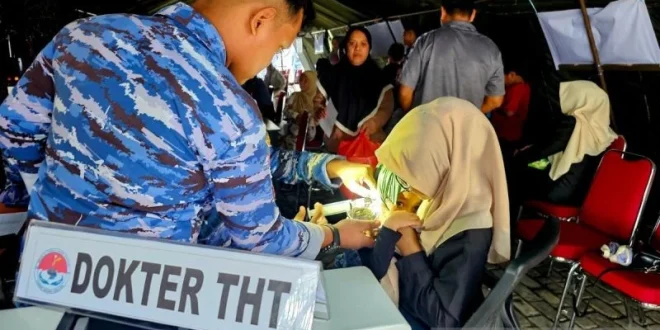 Pasukan Langit Si Penjaga Kesehatan Masyarakat di Beranda Negeri: Menghadapi Hujan yang Mengguyur Natuna